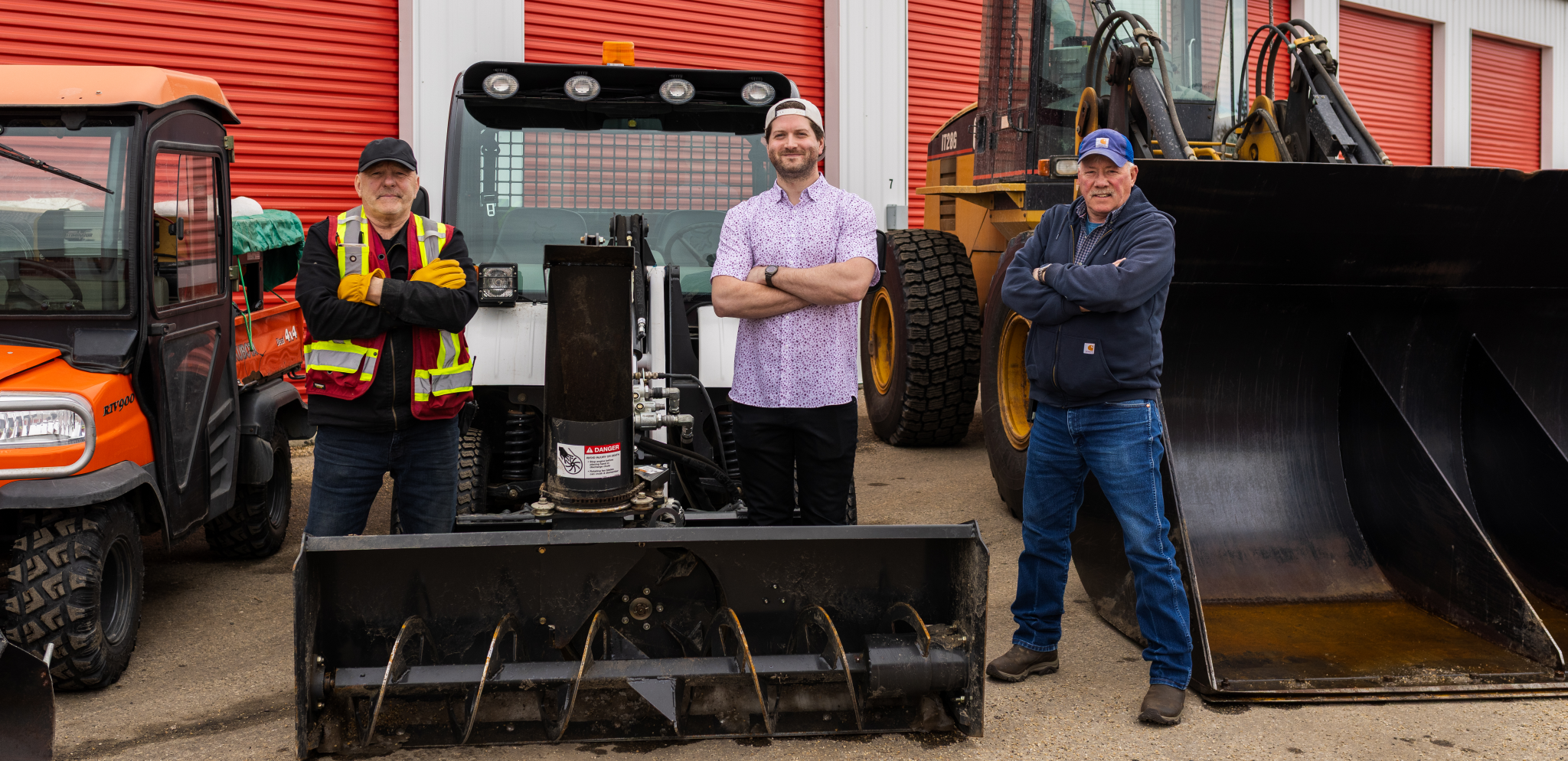 The Maxim Storage team standing proudly in front of the facility