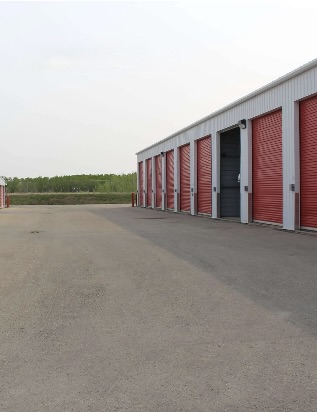 Smooth paved driveways ensuring clean access to drive-up storage units