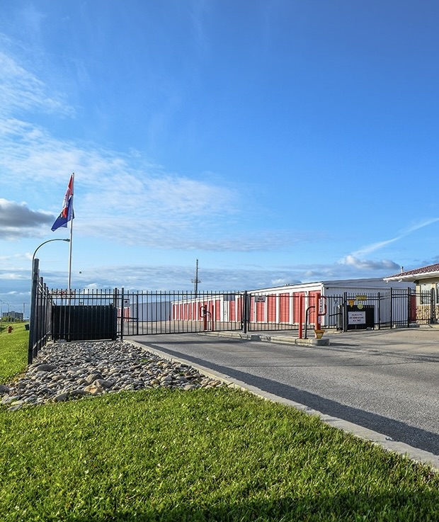 Fenced perimeter and secure gated entry at Maxim Storage Grande Prairie
