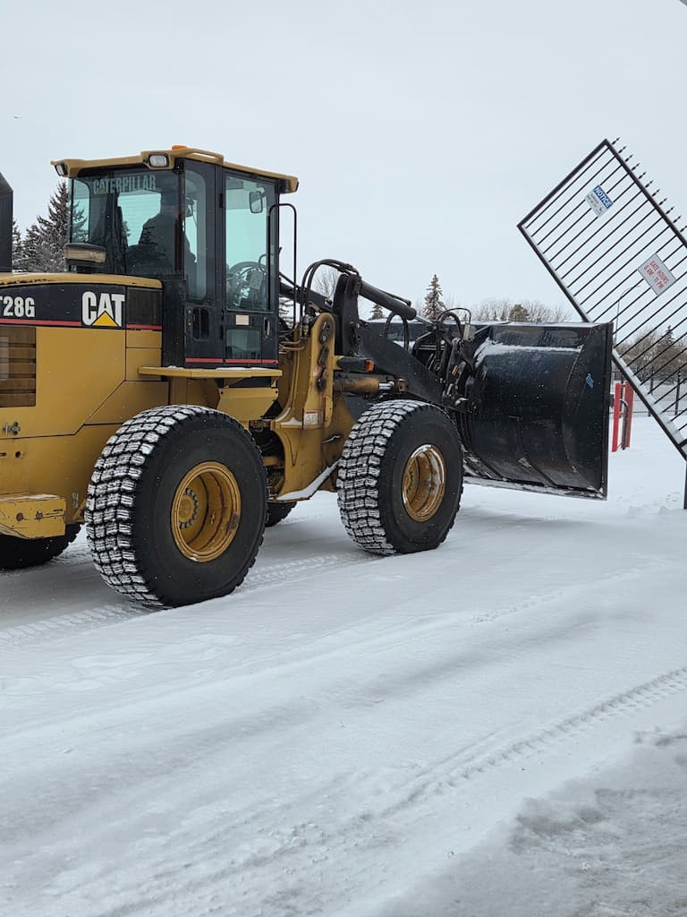 Wide paved lanes at Maxim Storage cleared of snow for easy winter access